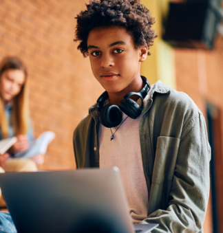 teenage boy using computer