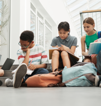 A group of kids studying together